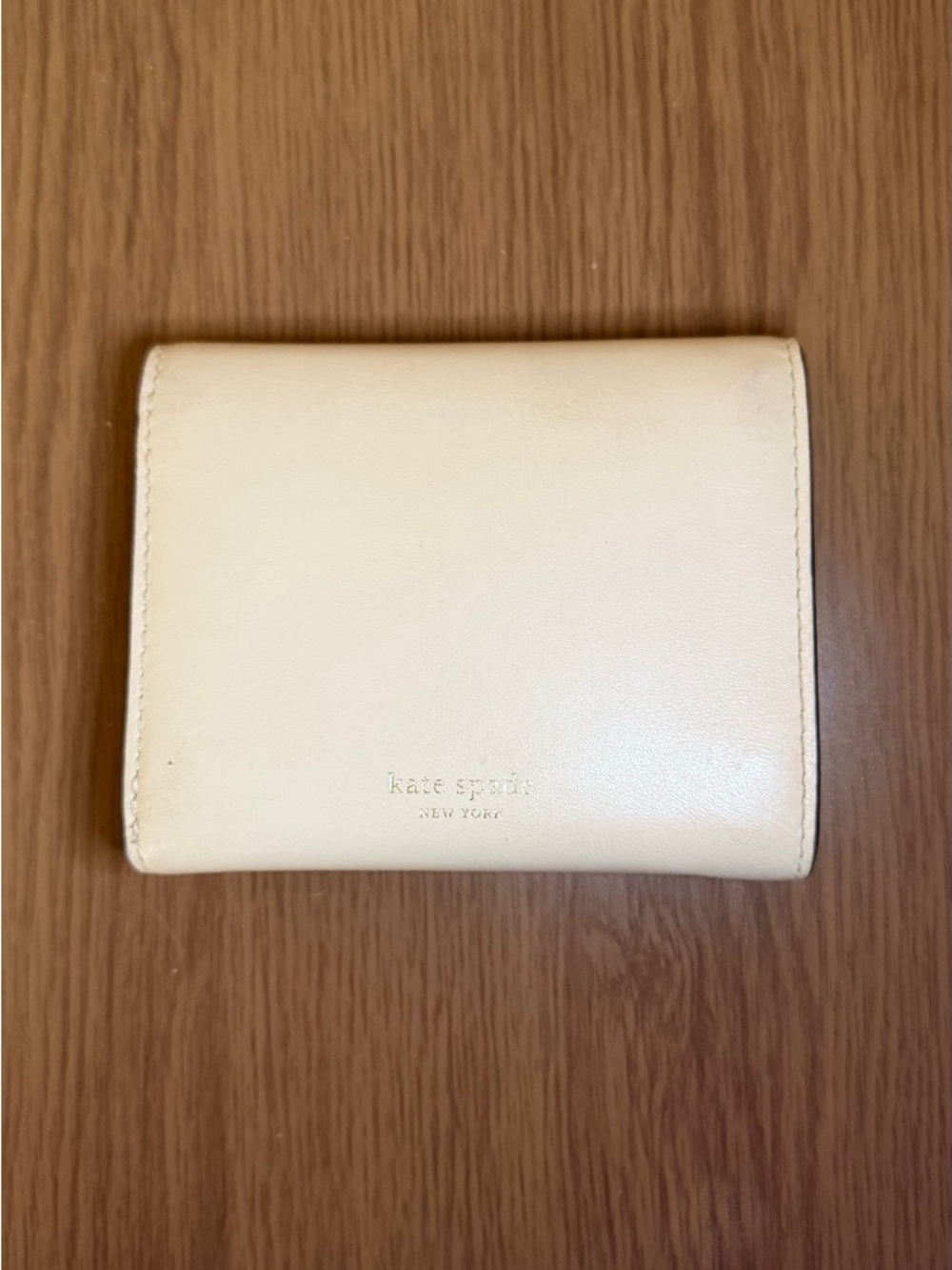 Kate Spade Cream Leather Compact Wallet with Spade Heart Emblem - Picture 4 of 9